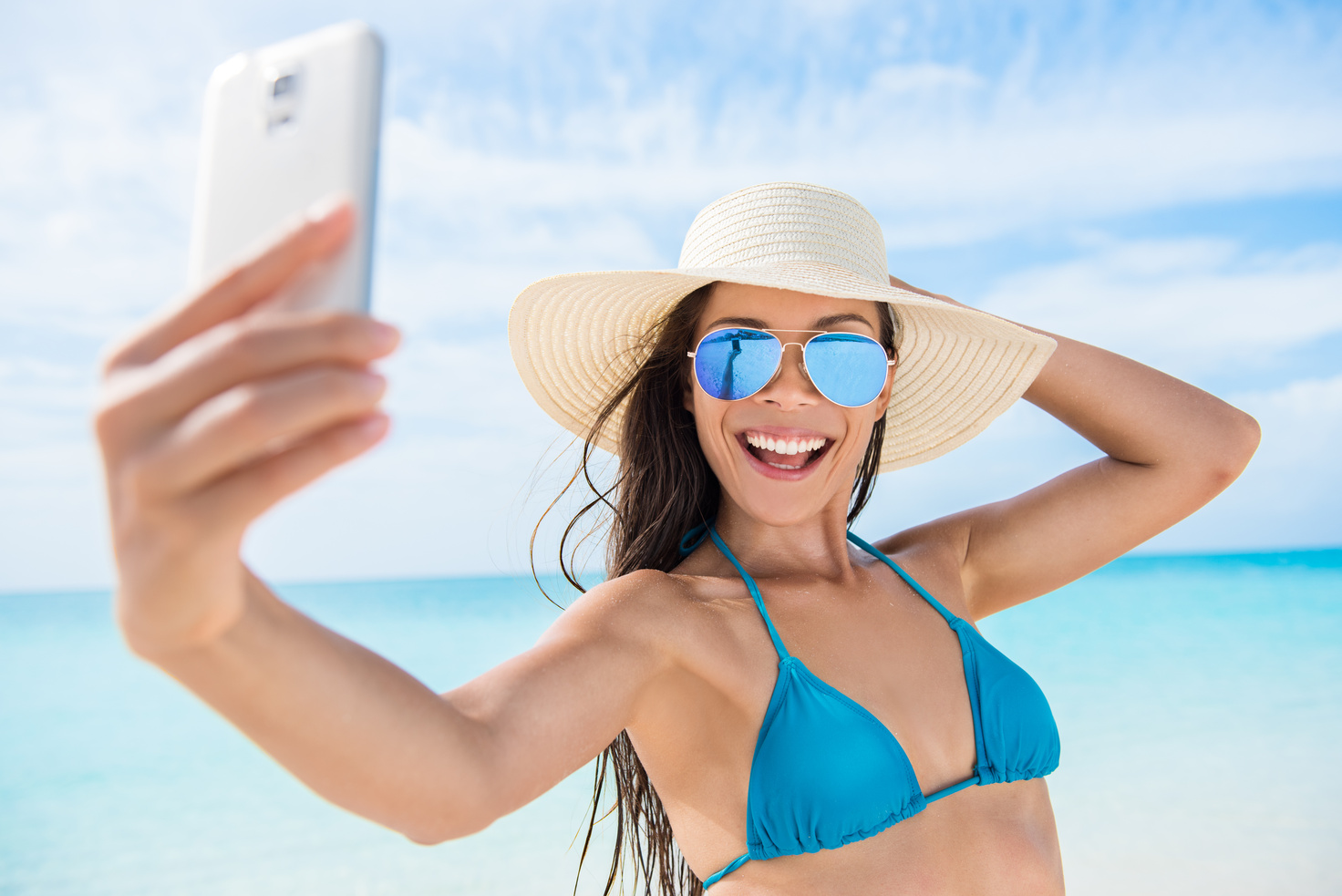 Girl Taking Photo on Beach